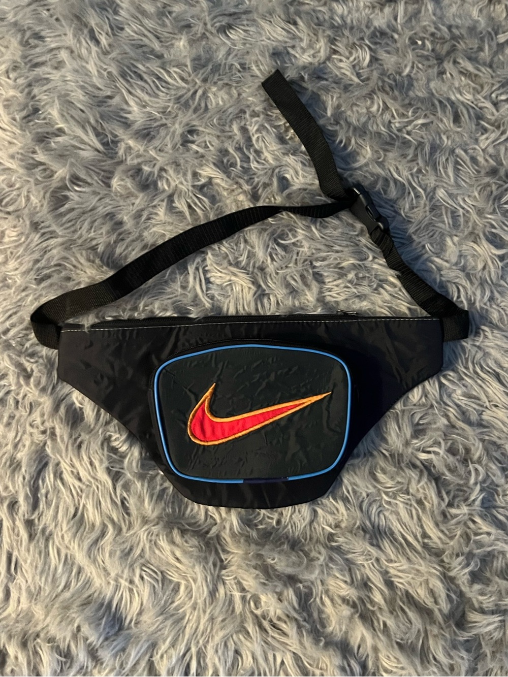 Upcycled Black Waist Pack with Red-to-Orange Swoosh and Blue Trim